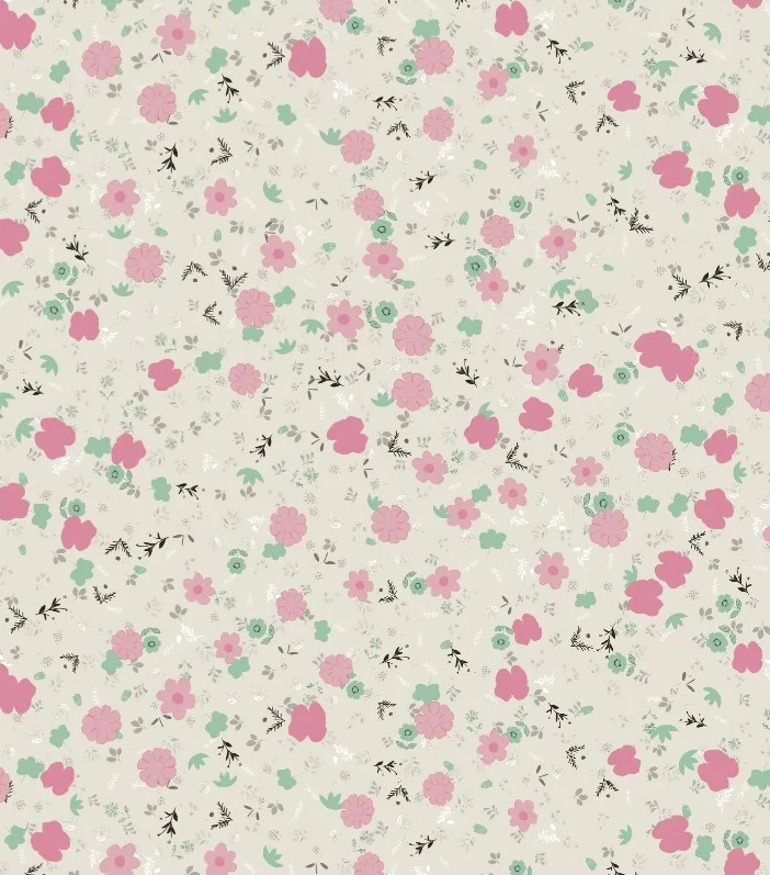 Un estampado floral menudo en rosa empolvado y salvia sobre crema